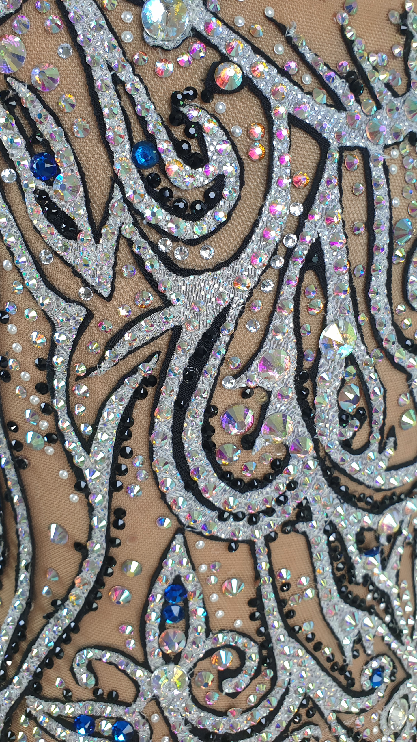 MYR350 rental price Silver Swirl Leotard (MYR1200 at Checkout Includes Security Deposit)